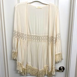 Cream colored tasseled top like new never worn